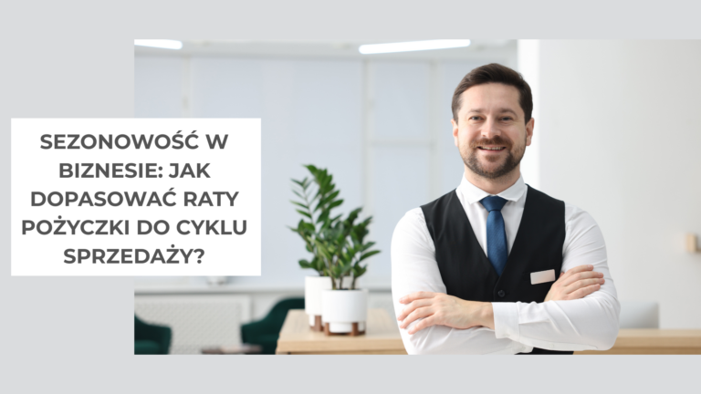 mężczyzna stoi w biurze z założonymi rękoma