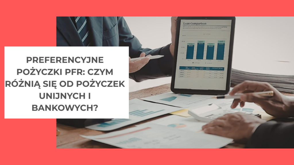 tablet z wykresami nad  stołem z dokumentami